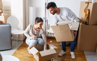 Couple Packing For A Move